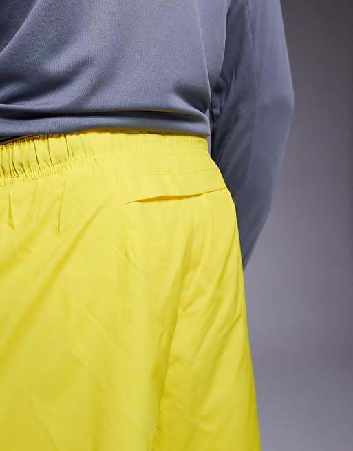 Nike Running Challenger Dri-FIT 7 inch shorts in yellow